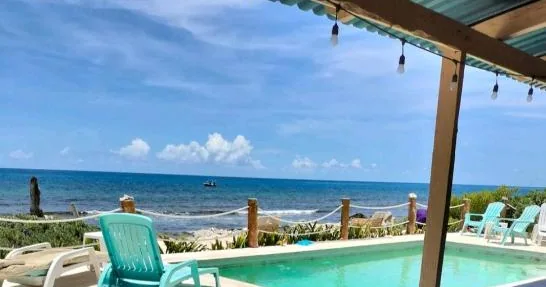 Sea and pool view from the Deluxe Double Room
